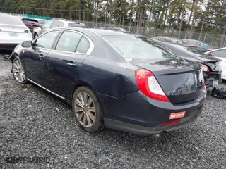 2014 Lincoln MKS EcoBoost with VIN 1LNHL9FT4EG607092, listed as a IAAI auction lot 41483964 with 89,624 mi miles. Bid and sale history available at carsss.com. Image 3.