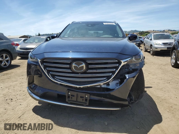 2021 Mazda CX-9 Grand Touring with VIN JM3TCBDY6M0520443, listed as a Copart auction lot 57403735 with 31,414 mi miles and Salvage title. Bid and sale history available at DreamBid. Image 5.