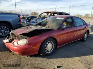 1998 Ford Taurus SE Comfort with VIN 1FAFP53S1WG176478, listed as a Copart auction lot 80528034 with 0 mi miles and Salvage Title. Bid and sale history available at carsss.com. Image 1.