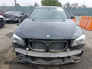 2015 BMW 7 Series 740i with VIN WBAYA6C54FG273188, listed as a IAAI auction lot 42563572 with 70,675 mi miles and . Bid and sale history available at DreamBid. Image 13.