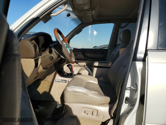 2000 Lexus LX 470 with VIN JT6HT00W7Y0114787, listed as a Copart auction lot 84433924 with 0 mi miles and Salvage Title. Bid and sale history available at carsss.com. Image 7.