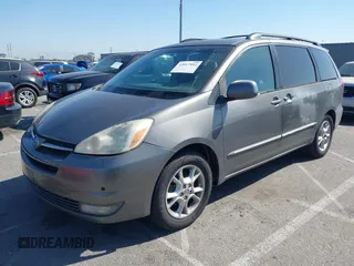 2005 Toyota Sienna XLE with VIN 5TDZA22C55S296645, listed as a IAAI auction lot 42017952 with 238,212 mi miles and . Bid and sale history available at DreamBid. Image 2.