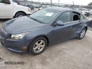 2014 Chevrolet Cruze 1LT with VIN 1G1PC5SB3E7467938, listed as a IAAI auction lot 41900700 with 125,040 mi miles and . Bid and sale history available at DreamBid. Image 2.