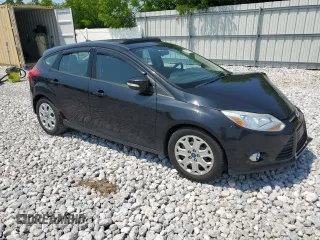 2012 Ford Focus SE z VIN 1FAHP3K22CL161005, wystawiony jako Copart lot #60203865 z przebiegiem 154 396 mil mil oraz Szkoda całkowita • Salvage title. Historia ofert i sprzedaży dostępna na DreamBid. Obrazek 4.