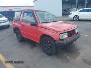 1995 Chevrolet Tracker z VIN 2CNBJ1869S6902771, wystawiony jako IAAI lot #41997456 z przebiegiem 171 629 mil mil oraz . Historia ofert i sprzedaży dostępna na DreamBid. Obrazek 1.
