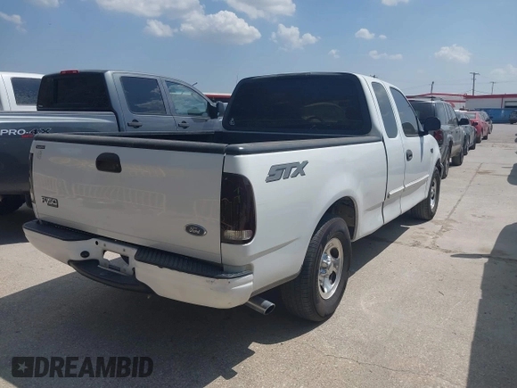 2004 Ford F-150 XL with VIN 2FTRX17264CA69306, listed as a IAAI auction lot 41869054 with 247,183 mi miles and . Bid and sale history available at DreamBid. Image 4.