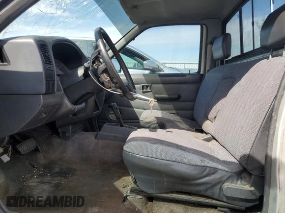 1997 Nissan Frontier XE with VIN 1N6SD11S2VC383896, listed as a Copart auction lot 50420165 with 285,970 mi miles and Salvage title. Bid and sale history available at DreamBid. Image 7.