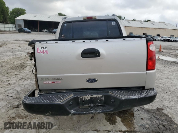 2004 Ford Explorer Sport Trac XLS z VIN 1FMDU67K74UA39405, wystawiony jako Copart lot #54615825 z przebiegiem 194 274 mil mil oraz Szkoda całkowita • Salvage title. Historia ofert i sprzedaży dostępna na DreamBid. Obrazek 6.