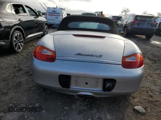 2001 Porsche Boxster S с VIN WP0CB29831S660325, выставлен на аукционе Copart как лот 79606054 с пробегом Не указан миль и На запчасти • Non repairable. История ставок и продаж доступна на DreamBid. Изображение 6.