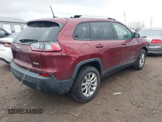 2020 Jeep Cherokee Latitude with VIN 1C4PJMCB3LD650308, listed as a IAAI auction lot 41052567 with 114,049 mi miles. Bid and sale history available at carsss.com. Image 4.