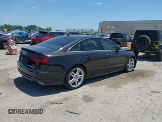 2016 Audi A6 Premium Plus with VIN WAUGFAFC0GN166596, listed as a IAAI auction lot 42526292 with 106,584 mi miles and . Bid and sale history available at DreamBid. Image 4.