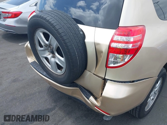2009 Toyota RAV4 with VIN JTMZF33V795001015, listed as a IAAI auction lot 42127341 with 175,808 mi miles and . Bid and sale history available at DreamBid. Image 6.