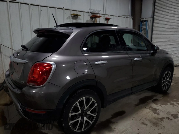 2016 FIAT 500X Trekking Plus с VIN ZFBCFYET6GP411632, выставлен на аукционе Copart как лот 43540735 с пробегом 87 608 миль миль и Списание • Salvage title. История ставок и продаж доступна на DreamBid. Изображение 3.