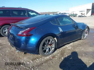2014 Nissan 370Z Nismo with VIN JN1AZ4EH9EM635608, listed as a IAAI auction lot 41333034 with 45,354 mi miles and . Bid and sale history available at DreamBid. Image 4.