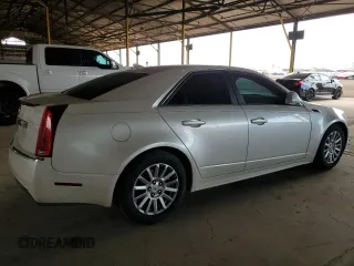 2012 Cadillac CTS with VIN 1G6DA5E52C0131731, listed as a Copart auction lot 59223235 with 104,521 mi miles and Salvage title. Bid and sale history available at DreamBid. Image 3.