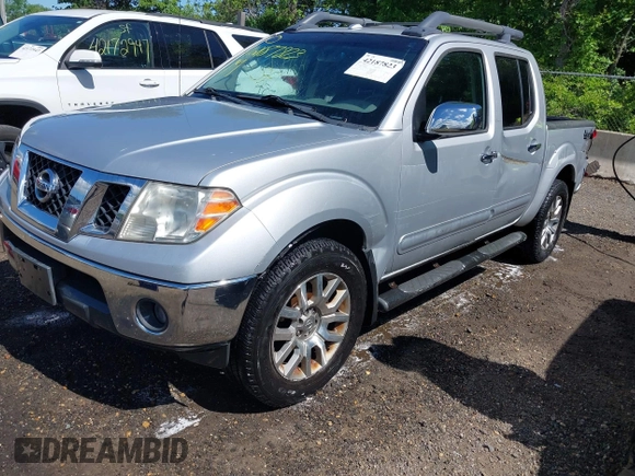 2011 Nissan Frontier Pro-4X with VIN 1N6AD0EV0BC408218, listed as a IAAI auction lot 42187823 with 165,995 mi miles and . Bid and sale history available at DreamBid. Image 2.