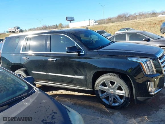 2015 Cadillac Escalade Premium with VIN 1GYS4CKJ0FR180180, listed as a IAAI auction lot 41054933 with 146,974 mi miles. Bid and sale history available at carsss.com. Image 13.