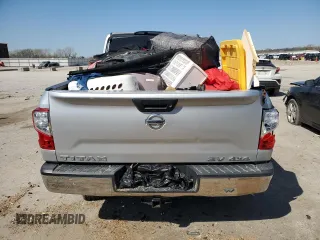 2018 Nissan Titan SV z VIN 1N6AA1EJ6JN542729, wystawiony jako Copart lot #52312035 z przebiegiem Nie podano mil oraz Szkoda całkowita • Salvage title. Historia ofert i sprzedaży dostępna na DreamBid. Obrazek 6.