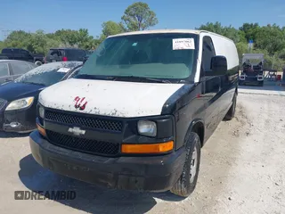 2005 Chevrolet Express Cargo Van with VIN 1GCGG29VX51196213, listed as a IAAI auction lot 41897062 with 417,674 mi miles. Bid and sale history available at carsss.com. Image 2.