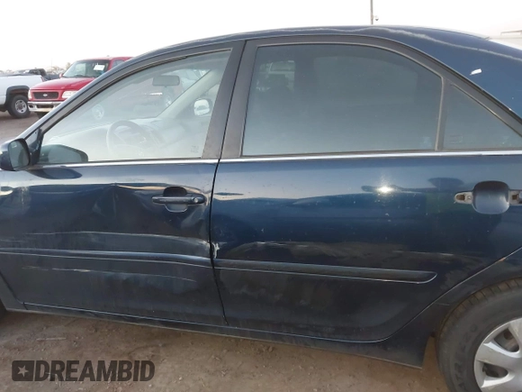 2004 Toyota Camry LE with VIN 4T1BE32K54U260916, listed as a IAAI auction lot 42052542 with 260,721 mi miles and . Bid and sale history available at carsss.com. Image 6.