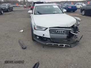 2016 Audi allroad Premium Plus with VIN WA1UFAFL5GA010559, listed as a IAAI auction lot 41918324 with 138,499 mi miles. Bid and sale history available at carsss.com. Image 20.