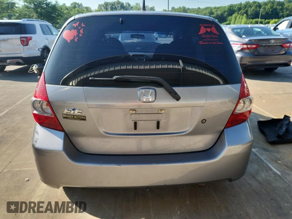 2007 Honda Fit with VIN JHMGD38407S066833, listed as a Copart auction lot 61713125 with 62,917 mi miles and Salvage title. Bid and sale history available at DreamBid. Image 6.
