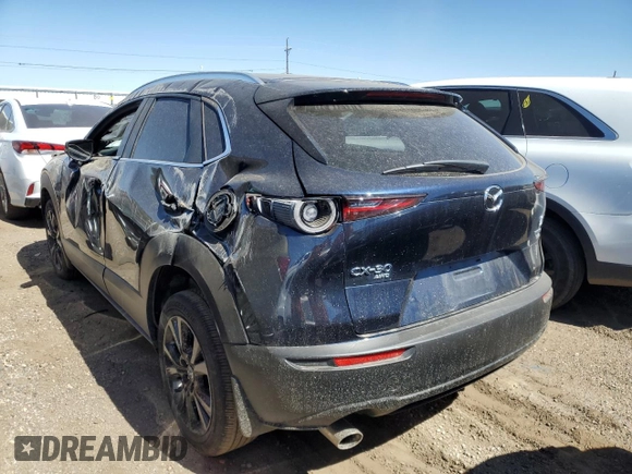 2022 Mazda CX-30 2.5 Turbo with VIN 3MVDMBAYXNM417439, listed as a Copart auction lot 57280884 with 13,590 mi miles and Salvage Title. Bid and sale history available at DreamBid. Image 2.
