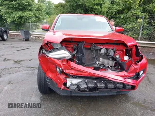 2020 Toyota Tacoma SR5 z VIN 3TMAZ5CN7LM128932, wystawiony jako IAAI lot #42220739 z przebiegiem 22 197 mil mil oraz . Historia ofert i sprzedaży dostępna na DreamBid. Obrazek 13.