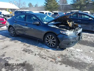 2015 Acura TLX V6 Tech with VIN 19UUB3F55FA000872, listed as a IAAI auction lot 41586406 with 142,067 mi miles. Bid and sale history available at carsss.com. Image 1.