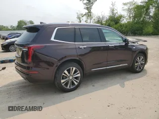 2020 Cadillac XT6 AWD Premium Luxury with VIN 1GYKPDRS4LZ129224, listed as a Copart auction lot 60328745 with 76,290 mi miles and Salvage title. Bid and sale history available at DreamBid. Image 3.