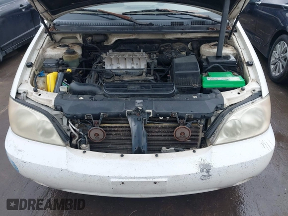 2004 Kia Sedona LX with VIN KNDUP131446537660, listed as a IAAI auction lot 41526183 with 282,891 mi miles. Bid and sale history available at carsss.com. Image 10.
