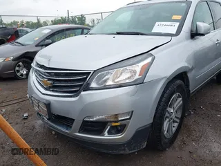 2016 Chevrolet Traverse LT z VIN 1GNKRHKDXGJ115343, wystawiony jako IAAI lot #42246084 z przebiegiem 148 021 mil mil oraz . Historia ofert i sprzedaży dostępna na DreamBid. Obrazek 6.