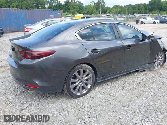 2021 Mazda 3 Preferred with VIN JM1BPBCL8M1330247, listed as a IAAI auction lot 42491066 with Not provided miles and . Bid and sale history available at DreamBid. Image 4.