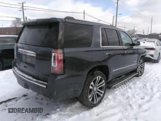 2020 GMC Yukon Denali with VIN 1GKS2CKJ6LR138351, listed as a IAAI auction lot 41316462 with 107,489 mi miles. Bid and sale history available at carsss.com. Image 4.