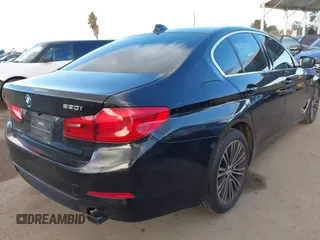 2019 BMW 5 Series 530i with VIN WBAJA5C54KWW45379, listed as a IAAI auction lot 41276092 with 77,025 mi miles. Bid and sale history available at carsss.com. Image 4.