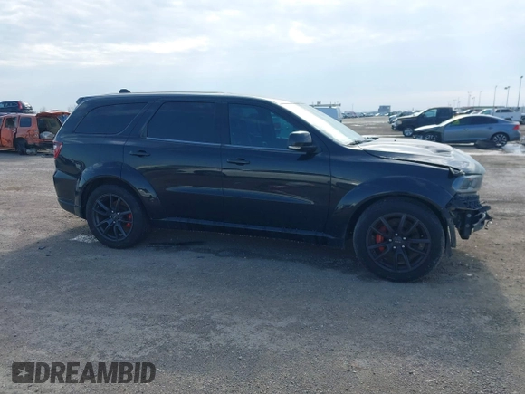 2019 Dodge Durango SRT with VIN 1C4SDJGJ2KC550562, listed as a IAAI auction lot 41549390 with 51,217 mi miles and . Bid and sale history available at DreamBid. Image 14.