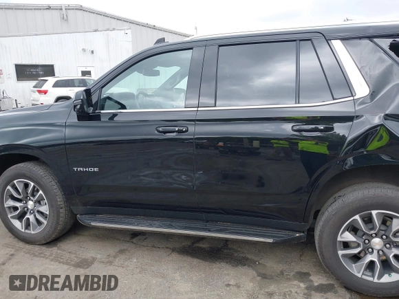 2023 Chevrolet Tahoe LT with VIN 1GNSKNKD8PR105849, listed as a IAAI auction lot 42308786 with 51,748 mi miles and . Bid and sale history available at DreamBid. Image 14.