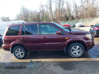 2007 Honda Pilot EX-L with VIN 5FNYF18647B004936, listed as a IAAI auction lot 41656465 with 225,580 mi miles and . Bid and sale history available at DreamBid. Image 14.