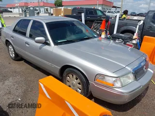 2005 Mercury Grand Marquis LS Premium z VIN 2MEFM75W95X636895, wystawiony jako IAAI lot #42521812 z przebiegiem 150 778 mil mil oraz . Historia ofert i sprzedaży dostępna na DreamBid. Obrazek 1.