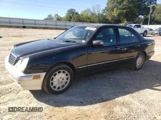 2000 Mercedes-Benz E-Class AWD with VIN WDBJF82JXYX035315, listed as a Copart auction lot 75568454 with 166,704 mi miles and Salvage Title. Bid and sale history available at carsss.com. Image 1.