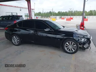 2015 Infiniti Q50 Premium with VIN JN1BV7AR1FM390739, listed as a IAAI auction lot 41865581 with 172,326 mi miles and . Bid and sale history available at DreamBid. Image 13.