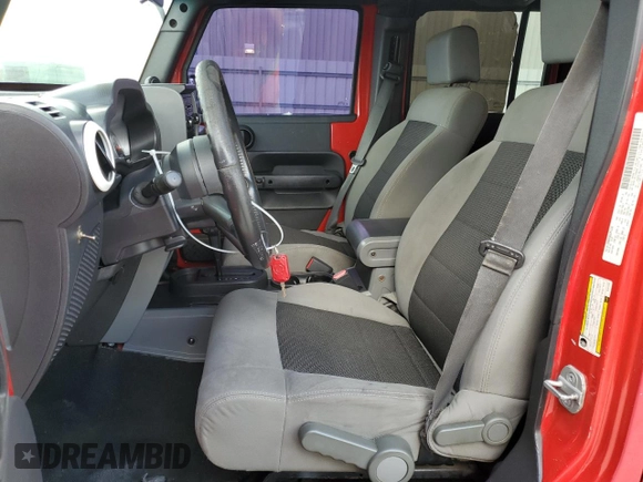 2008 Jeep Wrangler Unlimited X with VIN 1J4GB39198L515007, listed as a Copart auction lot 78979004 with 158,929 mi miles and Salvage Title. Bid and sale history available at DreamBid. Image 7.