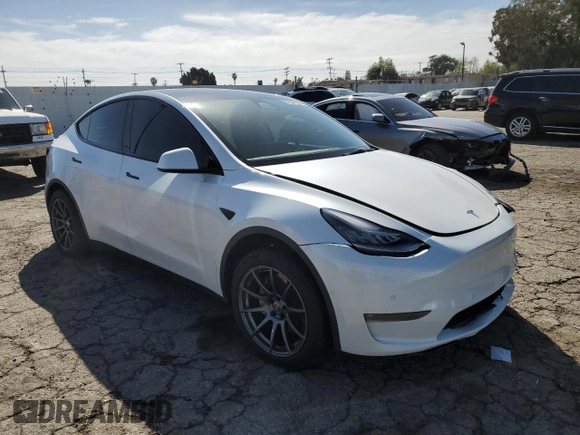 2021 Tesla Model Y Long Range with VIN 5YJYGDEEXMF146617, listed as a Copart auction lot 49347125 with 98,084 mi miles and Salvage Title. Bid and sale history available at DreamBid. Image 4.