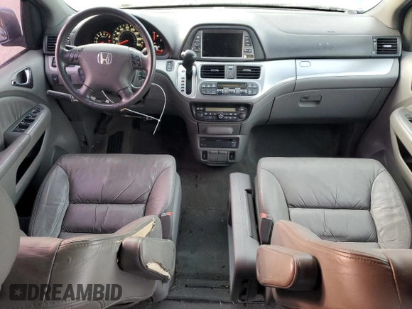 2009 Honda Odyssey EX-L with VIN 5FNRL38759B004710, listed as a Copart auction lot 54210425 with 171,674 mi miles and Salvage Title. Bid and sale history available at DreamBid. Image 8.