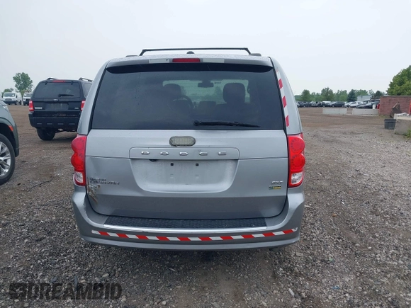 2018 Dodge Grand Caravan SXT z VIN 2C4RDGCG7JR301434, wystawiony jako IAAI lot #42510771 z przebiegiem 270 524 mil mil oraz . Historia ofert i sprzedaży dostępna na DreamBid. Obrazek 16.