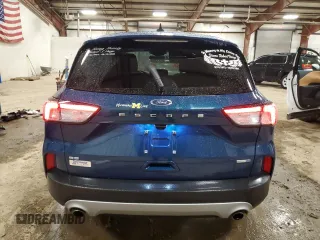 2020 Ford Escape SE with VIN 1FMCU9G6XLUB40792, listed as a Copart auction lot 49828565 with 18,748 mi miles and Salvage title. Bid and sale history available at DreamBid. Image 6.