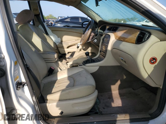 2005 Jaguar X-Type z VIN SAJWB52D55XE26531, wystawiony jako Copart lot #50909445 z przebiegiem 158 861 mil mil oraz Szkoda całkowita • Salvage title. Historia ofert i sprzedaży dostępna na DreamBid. Obrazek 7.