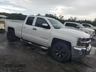 2016 Chevrolet Silverado 1500 LT with VIN 1GCVKREH1GZ424876, listed as a Copart auction lot 63009164 with 79,134 mi miles and Salvage Title. Bid and sale history available at DreamBid. Image 4.