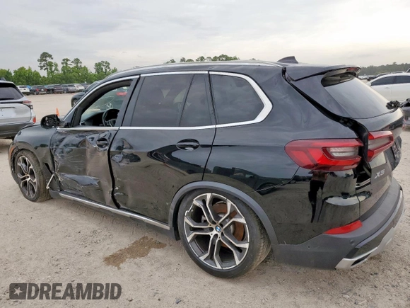 2022 BMW X5 xDrive40i with VIN 5UXCR6C01N9K79249, listed as a Copart auction lot 59142615 with 46,758 mi miles and Salvage title. Bid and sale history available at DreamBid. Image 2.