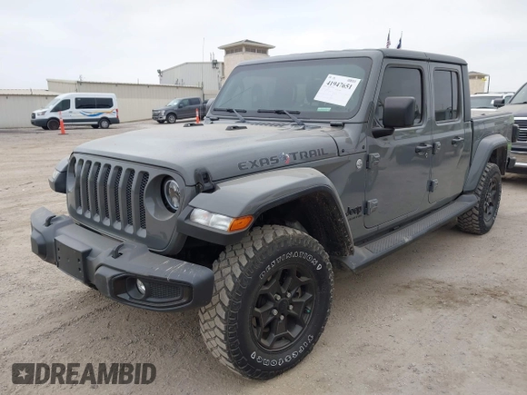 2022 Jeep Gladiator Willys with VIN 1C6JJTAMXNL137237, listed as a IAAI auction lot 41947651 with 55,199 mi miles and . Bid and sale history available at DreamBid. Image 2.